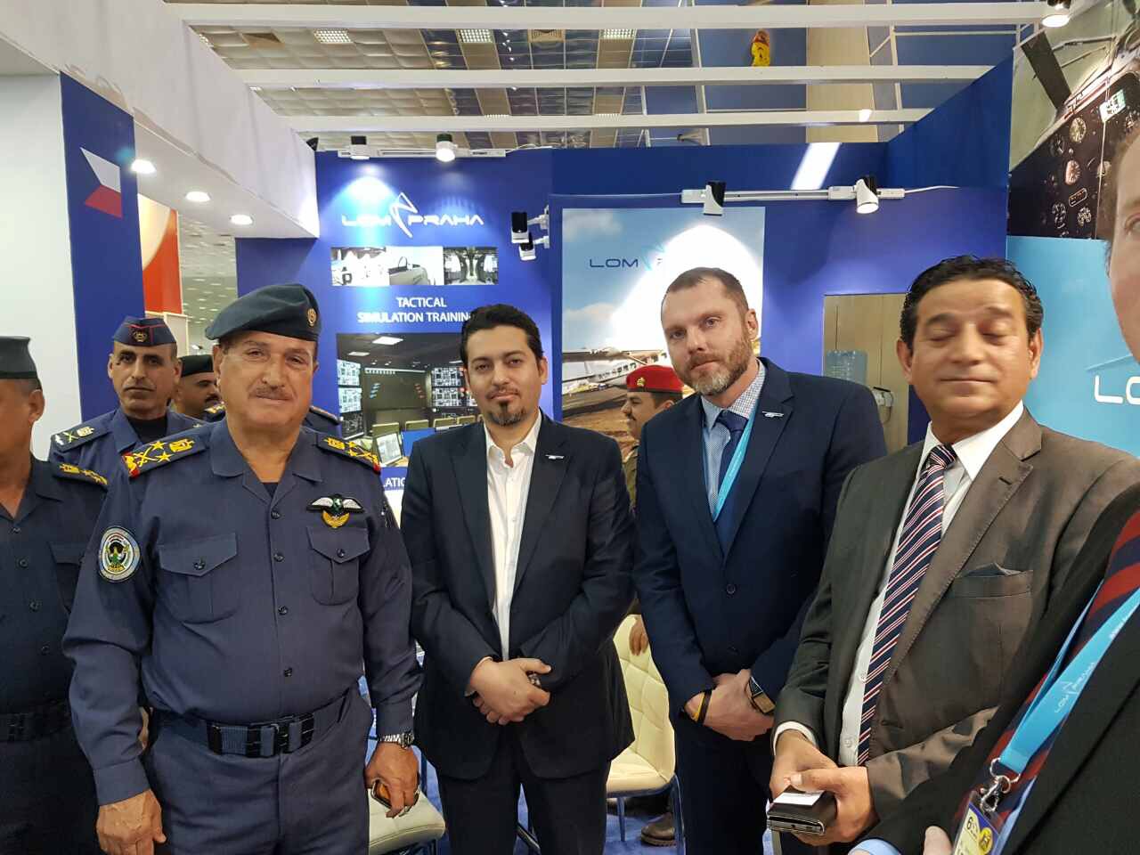 Caesar Dar team with officials at a defence and industry exhibition
